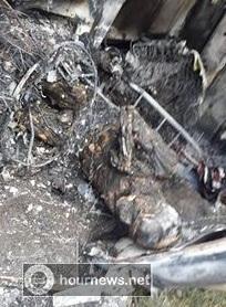 صورة لسائق الناقلة بعد تفحمه خلف عجلة القيادة